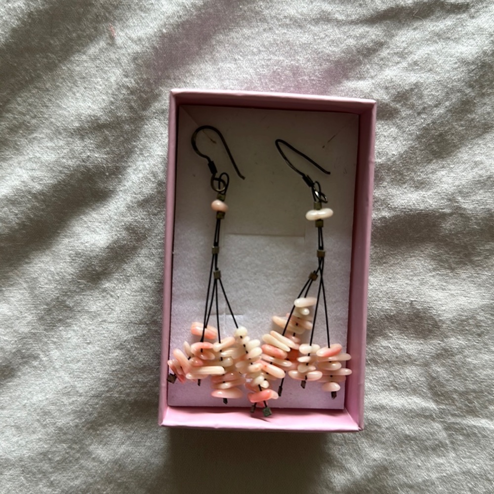 Pink earrings.
